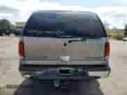 2003 Chevrolet Suburban LT z VIN 1GNEC16Z13J221251, wystawiony jako Copart lot #64169045 z przebiegiem 234 241 mil mil oraz Szkoda całkowita • Salvage title. Historia ofert i sprzedaży dostępna na DreamBid. Obrazek 6.