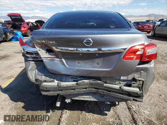 2017 Nissan Sentra S z VIN 3N1AB7AP2HY301442, wystawiony jako Copart lot #81315945 z przebiegiem 137 954 mil mil oraz Szkoda całkowita • Salvage title. Historia ofert i sprzedaży dostępna na DreamBid. Obrazek 6.