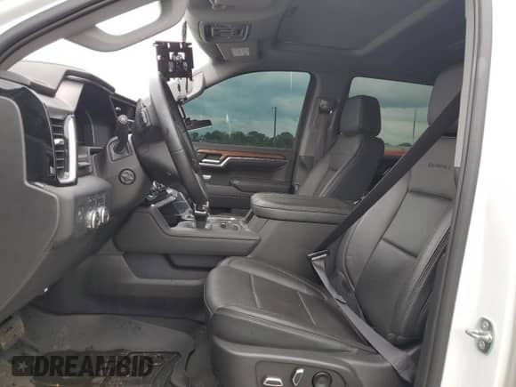 2023 GMC Sierra 1500 Denali with VIN 3GTUUGE80PG302715, listed as a Copart auction lot 55974565 with Not provided miles and Salvage title. Bid and sale history available at DreamBid. Image 7.