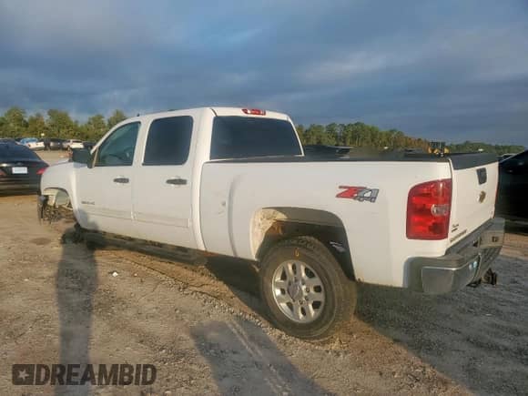 2013 Chevrolet Silverado 2500HD LT с VIN 1GC1KXCG1DF157748, выставлен на аукционе Copart как лот 82367485 с пробегом 153 381 миль миль и Списание • Salvage title. История ставок и продаж доступна на DreamBid. Изображение 2.