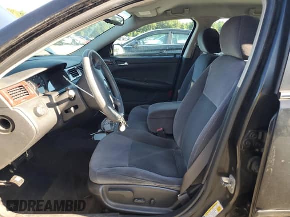2006 Chevrolet Impala LS z VIN 2G1WB55K469122539, wystawiony jako Copart lot #70328175 z przebiegiem 160 960 mil mil oraz Szkoda całkowita • Salvage title. Historia ofert i sprzedaży dostępna na DreamBid. Obrazek 7.
