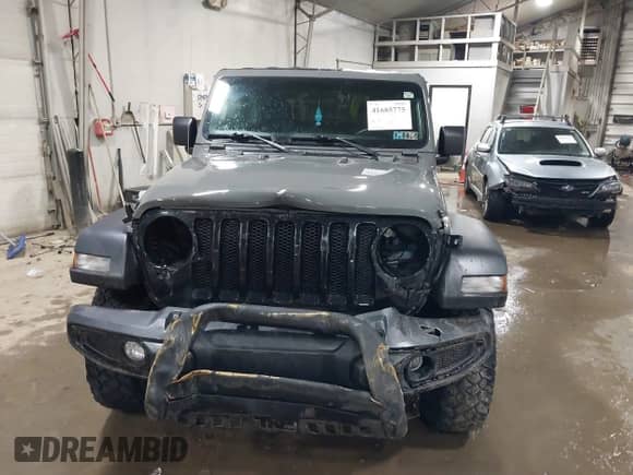2021 Jeep Wrangler Sport S with VIN 1C4GJXAN7MW647786, listed as a IAAI auction lot 41685775 with 31,907 mi miles and . Bid and sale history available at DreamBid. Image 12.