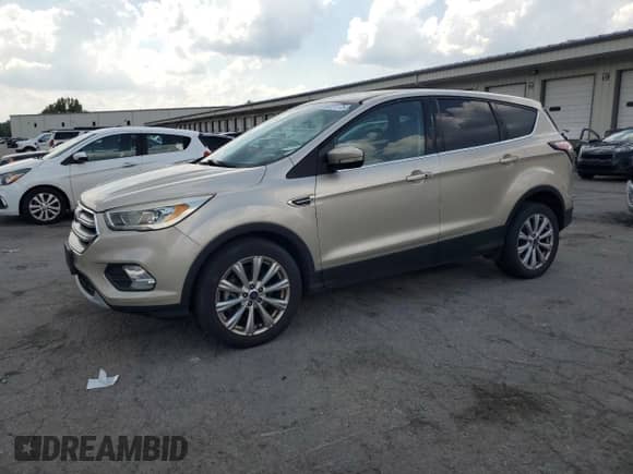 2017 Ford Escape Titanium with VIN 1FMCU9JDXHUC37599, listed as a Copart auction lot 69261175 with 110,175 mi miles and Salvage title. Bid and sale history available at DreamBid. Image 1.