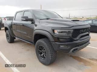 2021 Ram 1500 TRX with VIN 1C6SRFU92MN805007, listed as a IAAI auction lot 42458464 with 48,983 mi miles and . Bid and sale history available at DreamBid. Image 1.