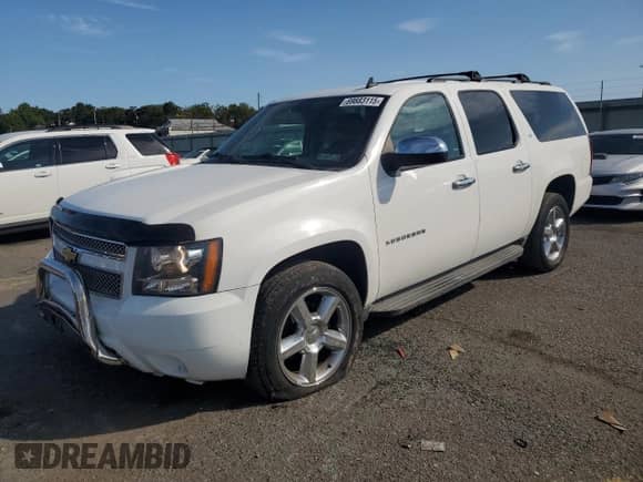 2013 Chevrolet Suburban LT с VIN 1GNSKJE71DR192536, выставлен на аукционе Copart как лот 69883115 с пробегом 139 204 миль миль и Списание • Salvage title. История ставок и продаж доступна на DreamBid. Изображение 1.