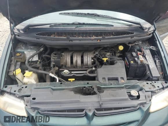 1997 Dodge Caravan SE z VIN 2B4GP44R4VR202585, wystawiony jako Copart lot #68703985 z przebiegiem 188 500 mil mil oraz Szkoda całkowita • Salvage title. Historia ofert i sprzedaży dostępna na DreamBid. Obrazek 12.