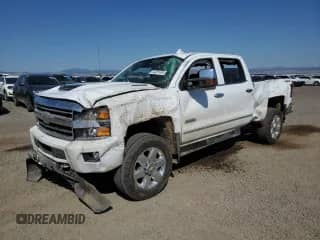 2018 Chevrolet Silverado 2500HD High Country с VIN 1GC1KXEY0JF213275, выставлен на аукционе Copart как лот 54201495 с пробегом 74 056 миль миль и Списание • Salvage title. История ставок и продаж доступна на DreamBid. Изображение 1.
