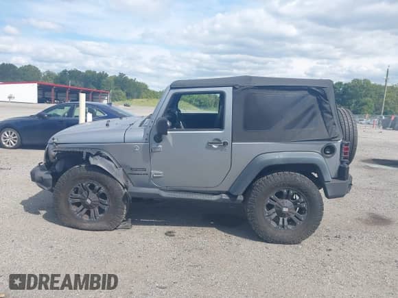 2013 Jeep Wrangler Sport with VIN 1C4AJWAG4DL661597, listed as a IAAI auction lot 43133496 with 80,714 mi miles and . Bid and sale history available at DreamBid. Image 14.