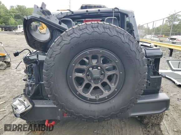 2023 Jeep Wrangler Rubicon with VIN 1C4HJXFN9PW507594, listed as a Copart auction lot 73111214 with Not provided miles and Salvage title. Bid and sale history available at DreamBid. Image 6.