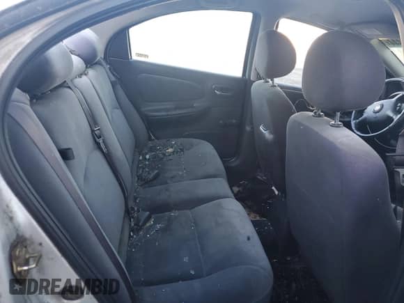 2001 Dodge Neon Highline z VIN 1B3ES46CX1D124958, wystawiony jako Copart lot #75360444 z przebiegiem Nie podano mil oraz Szkoda całkowita • Salvage title. Historia ofert i sprzedaży dostępna na DreamBid. Obrazek 10.