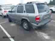 2001 Nissan Pathfinder SE z VIN JN8DR07Y91W504858, wystawiony jako IAAI lot #42451823 z przebiegiem 185 336 mil mil oraz . Historia ofert i sprzedaży dostępna na DreamBid. Obrazek 3.