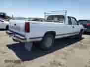 1993 Chevrolet Silverado 2500 z VIN 1GCFK29K2PE206891, wystawiony jako Copart lot #59304904 z przebiegiem 206 433 mil mil oraz Czysty tytuł • Clean title. Historia ofert i sprzedaży dostępna na DreamBid. Obrazek 3.