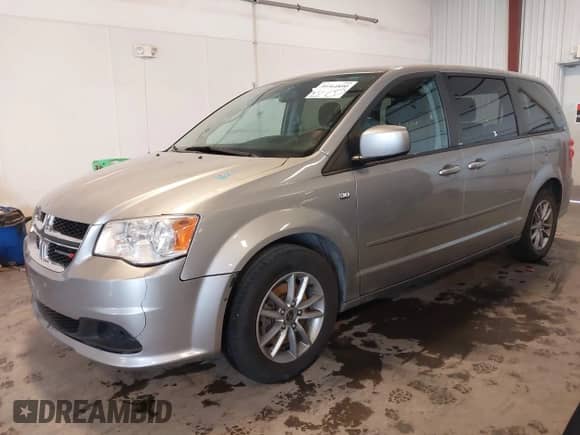 2014 Dodge Grand Caravan SE 30th Anniversary with VIN 2C4RDGBG3ER190470, listed as a IAAI auction lot 39764890 with 176,185 mi miles and . Bid and sale history available at DreamBid. Image 2.