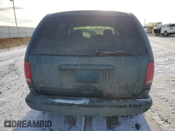2000 Dodge Caravan SE z VIN 2B4GP45G2YR702617, wystawiony jako Copart lot #87403154 z przebiegiem Nie podano mil oraz Szkoda całkowita • Salvage title. Historia ofert i sprzedaży dostępna na DreamBid. Obrazek 6.