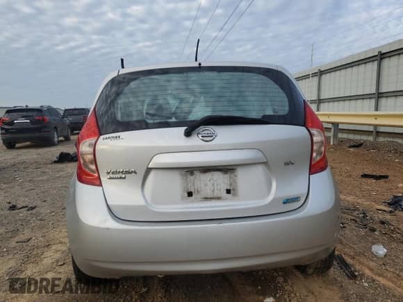 2014 Nissan Note S with VIN 3N1CE2CPXEL419294, listed as a Copart auction lot 67392115 with 205,385 mi miles and Salvage title. Bid and sale history available at DreamBid. Image 6.