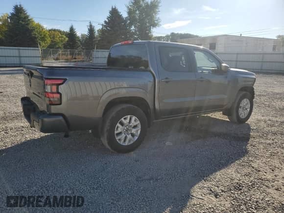 2023 Nissan Frontier Pro-4X with VIN 1N6ED1EK3PN659758, listed as a Copart auction lot 80692565 with 16,842 mi miles and Salvage title. Bid and sale history available at DreamBid. Image 3.