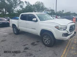 2017 Toyota Tacoma SR5 with VIN 5TFAZ5CN4HX043063, listed as a IAAI auction lot 42699472 with 290,574 mi miles and . Bid and sale history available at DreamBid. Image 1.