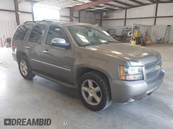 2014 Chevrolet Tahoe LTZ с VIN 1GNSCCE03ER150821, выставлен на аукционе IAAI как лот 42912953 с пробегом 194 995 миль миль и . История ставок и продаж доступна на DreamBid. Изображение 1.