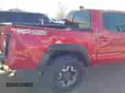 2021 Toyota Tacoma SR z VIN 5TFCZ5AN0MX262902, wystawiony jako IAAI lot #43535009 z przebiegiem 70 926 mil mil oraz . Historia ofert i sprzedaży dostępna na DreamBid. Obrazek 17.