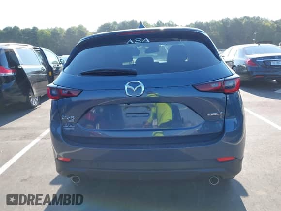 2023 Mazda CX-5 S Preferred z VIN JM3KFBCM6P0209360, wystawiony jako IAAI lot #43123619 z przebiegiem Nie podano mil oraz . Historia ofert i sprzedaży dostępna na DreamBid. Obrazek 15.