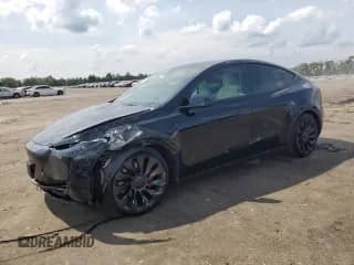 2023 Tesla Model Y Performance z VIN 7SAYGDEF8PF920783, wystawiony jako Copart lot #63180205 z przebiegiem 21 995 mil mil oraz Szkoda całkowita • Salvage title. Historia ofert i sprzedaży dostępna na DreamBid. Obrazek 1.