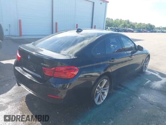 2018 BMW 4 Series 430i with VIN WBA4J1C51JBM10689, listed as a IAAI auction lot 42898652 with 111,516 mi miles and . Bid and sale history available at DreamBid. Image 4.