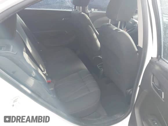 2012 Chevrolet Sonic LT z VIN 1G1JD5SHXC4231096, wystawiony jako IAAI lot #42188654 z przebiegiem 114 035 mil mil oraz . Historia ofert i sprzedaży dostępna na DreamBid. Obrazek 8.