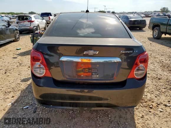 2016 Chevrolet Sonic LT с VIN 1G1JC5SHXG4134232, выставлен на аукционе Copart как лот 80779775 с пробегом 116 676 миль миль и Списание • Salvage title. История ставок и продаж доступна на DreamBid. Изображение 6.