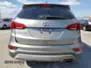 2018 Hyundai Santa Fe 2.4L с VIN 5NMZT3LB1JH089446, выставлен на аукционе Copart как лот 87306895 с пробегом 95 904 миль миль и Списание • Salvage title. История ставок и продаж доступна на DreamBid. Изображение 6.