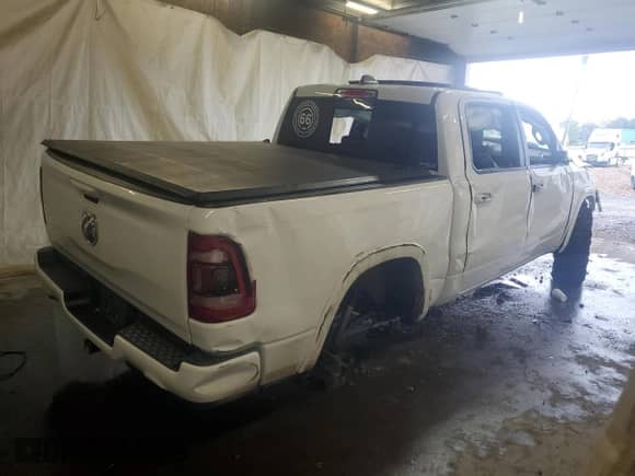 2020 Ram 1500 Laramie with VIN 1C6SRFJT9LN183908, listed as a Copart auction lot 81618125 with Not provided miles and Salvage title. Bid and sale history available at DreamBid. Image 3.
