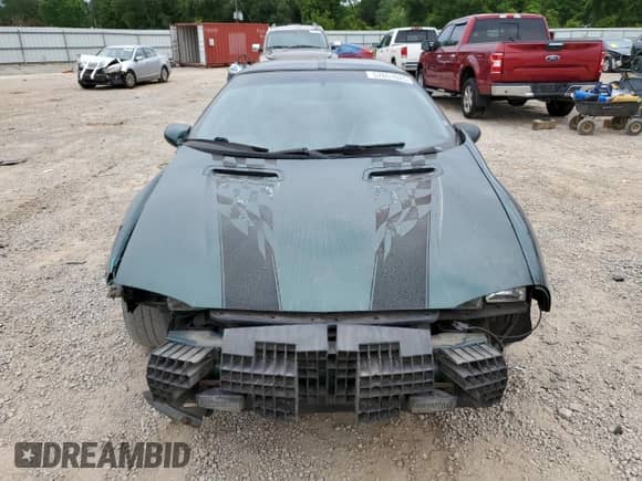 1997 Chevrolet Camaro Z28 z VIN 2G1FP22P6V2156828, wystawiony jako Copart lot #57651625 z przebiegiem 131 803 mil mil oraz Szkoda całkowita • Salvage title. Historia ofert i sprzedaży dostępna na DreamBid. Obrazek 5.