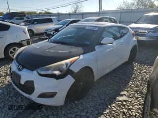 2012 Hyundai Veloster w/Gray Int z VIN KMHTC6AD3CU021197, wystawiony jako Copart lot #84803605 z przebiegiem 170 338 mil mil oraz Szkoda całkowita • Salvage title. Historia ofert i sprzedaży dostępna na DreamBid. Obrazek 1.