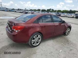 2015 Chevrolet Cruze LT z VIN 1G1PC5SB5F7132407, wystawiony jako Copart lot #58106495 z przebiegiem 111 110 mil mil oraz Czysty tytuł • Clean title. Historia ofert i sprzedaży dostępna na DreamBid. Obrazek 3.