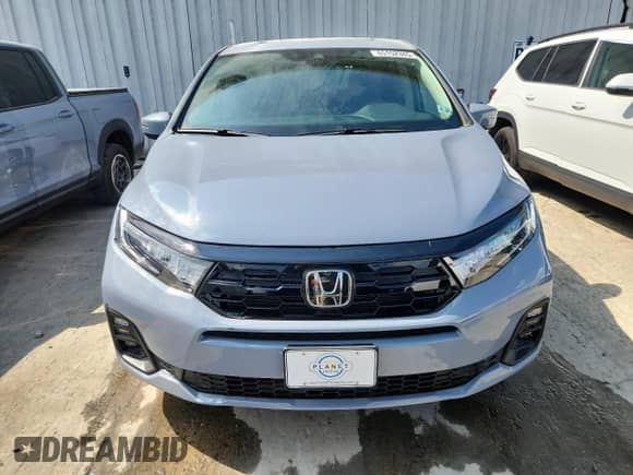 2025 Honda Odyssey Touring с VIN 5FNRL6H87SB074287, выставлен на аукционе Copart как лот 65152345 с пробегом Не указан миль и Списание • Salvage title. История ставок и продаж доступна на DreamBid. Изображение 5.