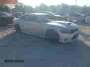 2023 Dodge Charger Scat Pack z VIN 2C3CDXGJ2PH651097, wystawiony jako IAAI lot #43270783 z przebiegiem 41 278 mil mil oraz . Historia ofert i sprzedaży dostępna na DreamBid. Obrazek 1.