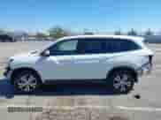 2018 Honda Pilot EX-L with VIN 5FNYF5H52JB026830, listed as a IAAI auction lot 42853756 with 15,305 mi miles and . Bid and sale history available at DreamBid. Image 15.