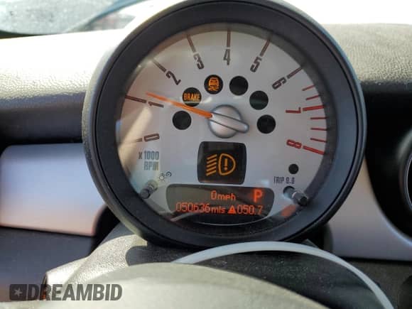 2011 MINI Hardtop with VIN WMWSU3C52BT253034, listed as a Copart auction lot 90109305 with 50,636 mi miles and Salvage title. Bid and sale history available at DreamBid. Image 9.