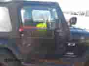 2003 Jeep Wrangler X with VIN 1J4FA39S63P330826, listed as a IAAI auction lot 41476438 with 146,517 mi miles and . Bid and sale history available at DreamBid. Image 13.