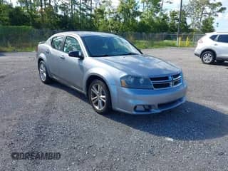 2013 Dodge Avenger SE V6 with VIN 1C3CDZAG0DN521234, listed as a IAAI auction lot 43122404 with 190,140 mi miles and . Bid and sale history available at DreamBid. Image 1.
