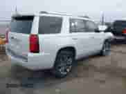 2018 Chevrolet Tahoe Premier with VIN 1GNSKCKC6JR136925, listed as a IAAI auction lot 41082133 with 128,280 mi miles and . Bid and sale history available at DreamBid. Image 4.