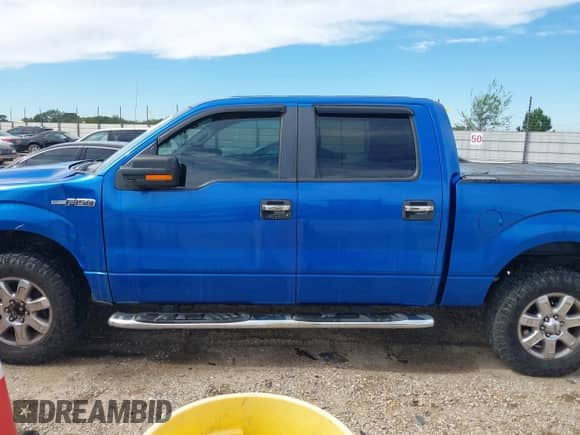 2013 Ford F-150 Lariat z VIN 1FTFW1EF9DFD64304, wystawiony jako IAAI lot #43287528 z przebiegiem 143 714 mil mil oraz . Historia ofert i sprzedaży dostępna na DreamBid. Obrazek 14.