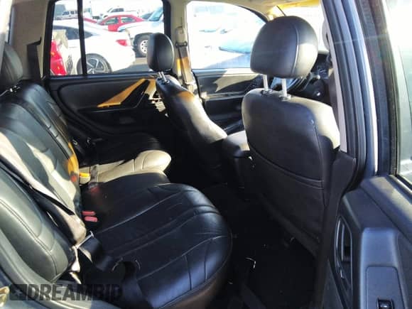 2003 Jeep Grand Cherokee Laredo z VIN 1J4GX48S93C618955, wystawiony jako IAAI lot #34580156 z przebiegiem 183 875 mil mil oraz . Historia ofert i sprzedaży dostępna na DreamBid. Obrazek 8.