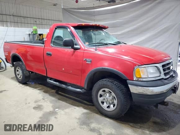 2000 Ford F-150 XL с VIN 1FTPF18L2YNA25370, выставлен на аукционе Copart как лот 69598605 с пробегом Не указан миль и Списание • Salvage title. История ставок и продаж доступна на DreamBid. Изображение 4.