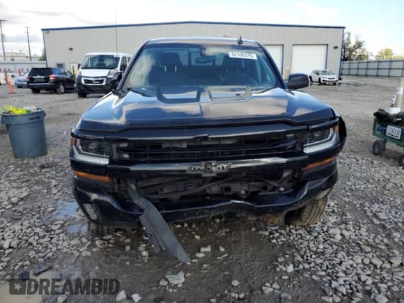 2017 Chevrolet Silverado 1500 LT z VIN 3GCUKREC6HG124686, wystawiony jako Copart lot #82100375 z przebiegiem 117 074 mil mil oraz Nie do naprawy • Non repairable. Historia ofert i sprzedaży dostępna na DreamBid. Obrazek 5.