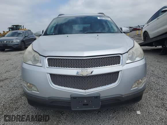 2012 Chevrolet Traverse LTZ с VIN 1GNKVLED5CJ155463, выставлен на аукционе Copart как лот 56478935 с пробегом Не указан миль и Списание • Salvage title. История ставок и продаж доступна на DreamBid. Изображение 5.