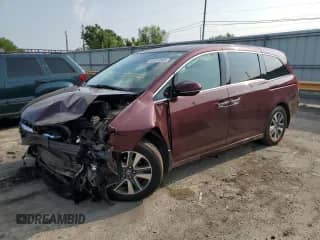 2016 Honda Odyssey Touring Elite z VIN 5FNRL5H92GB022995, wystawiony jako Copart lot #68914565 z przebiegiem 101 450 mil mil oraz Czysty tytuł • Clean title. Historia ofert i sprzedaży dostępna na DreamBid. Obrazek 1.