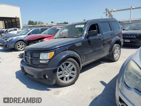 2011 Dodge Nitro Heat with VIN 1D4PU4GK5BW568281, listed as a Copart auction lot 68473814 with Not provided miles and Salvage title. Bid and sale history available at DreamBid. Image 1.