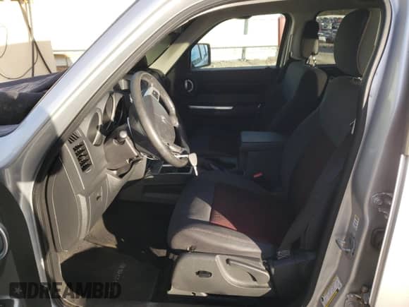2011 Dodge Nitro with VIN 1D4PU6GX8BW563471, listed as a Copart auction lot 83380054 with 118,659 mi miles and Salvage title. Bid and sale history available at DreamBid. Image 7.
