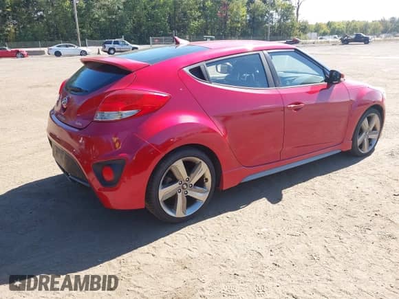 2013 Hyundai Veloster Turbo с VIN KMHTC6AE2DU164913, выставлен на аукционе IAAI как лот 43360263 с пробегом 166 585 миль миль и . История ставок и продаж доступна на DreamBid. Изображение 4.