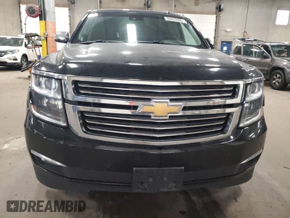 2015 Chevrolet Suburban LTZ с VIN 1GNSKKKC8FR120677, выставлен на аукционе Copart как лот 86426505 с пробегом 156 320 миль миль и Списание • Salvage title. История ставок и продаж доступна на DreamBid. Изображение 5.
